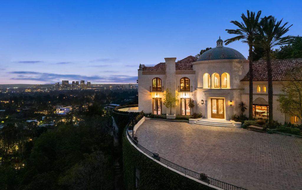 Experience opulent living in Beverly Hills' most desirable zip code with The Cielo Estate. This palatial Andalusian-style masterpiece features 9 bedrooms, 18 bathrooms, 21,000 sq. ft. living space, and 3.60 acres lot size. Enjoy breathtaking city and ocean views, a detached guest house, movie theatre, spa, gym, billiards room, bar, and a 75-yard pool with 3 waterfalls, 2 spas, a 35-foot water slide, and more.