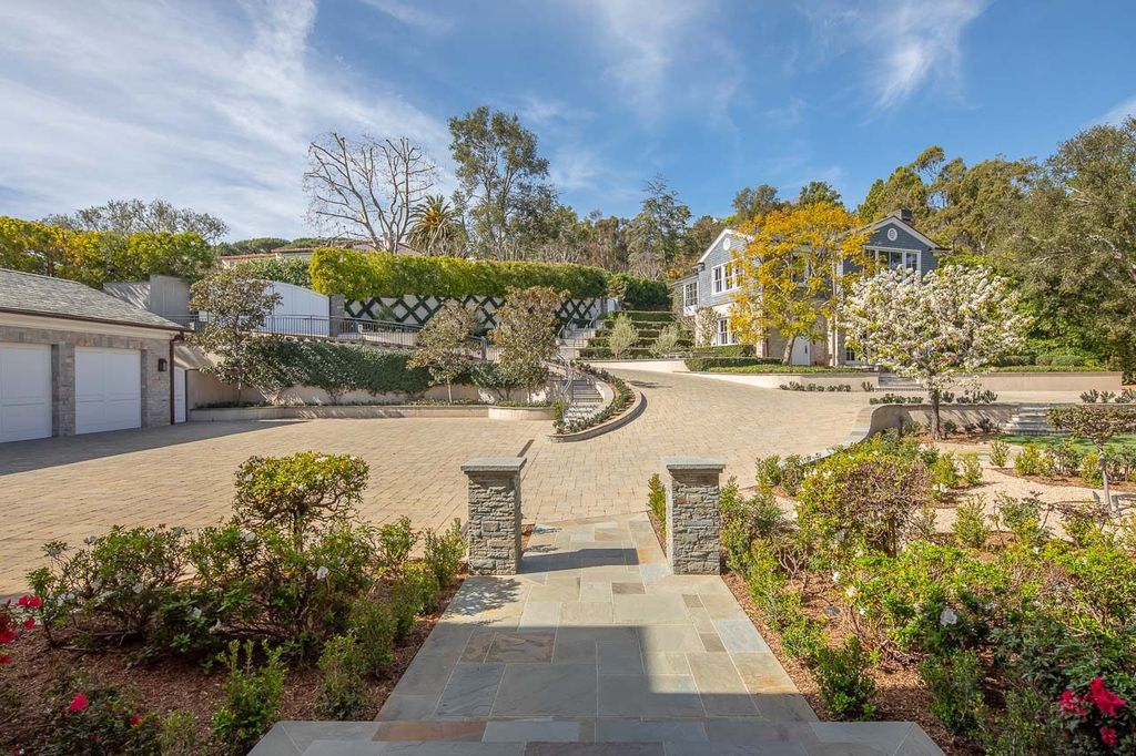 This stunning estate located at 1678 Alta Mura Rd in Pacific Palisades, California 90272, is a true gem of the Palisades Riviera. Boasting 8 bedrooms, 14 bathrooms, and a living space of 16,000 square feet on a 1.08-acre lot, this LEED-certified compound offers luxury and privacy in an unbeatable location.