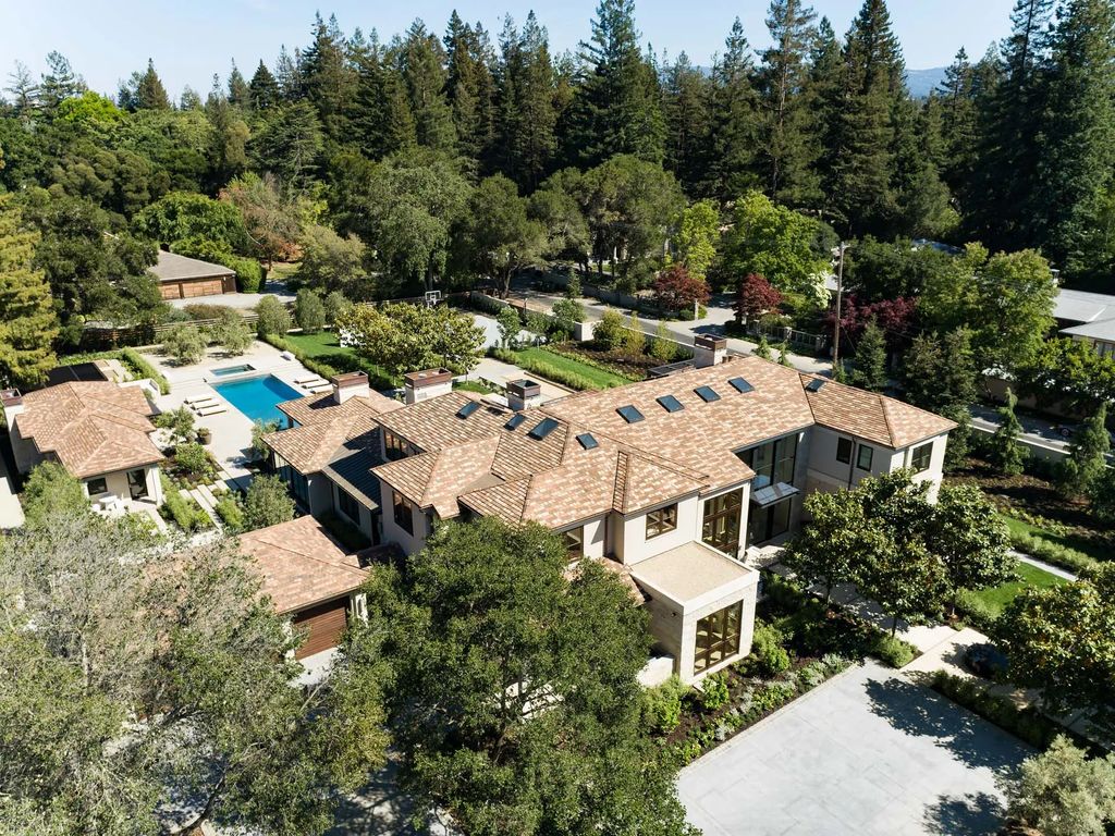 Located in the highly sought-after Atherton neighborhood of Silicon Valley, this stunning custom-curated home is a masterpiece of luxury, form, and function. Built in 2022 on a sprawling 1.30-acre lot, this property boasts 6 bedrooms, 11 baths, and a spacious living area of 14,215 square feet.