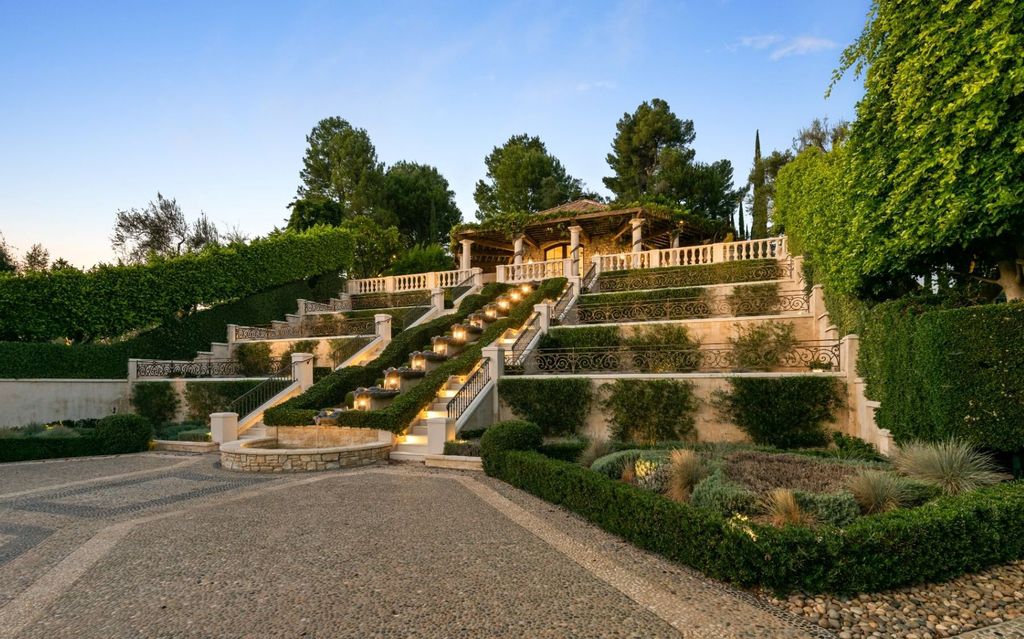 The Antelo View Estate is a luxurious property located at 2911 Antelo View Drive in Los Angeles, California, with a total of 9 bedrooms and 14 bathrooms. This grand estate is situated on 5.36 acres of land and is surrounded by double-gates, offering complete privacy.
