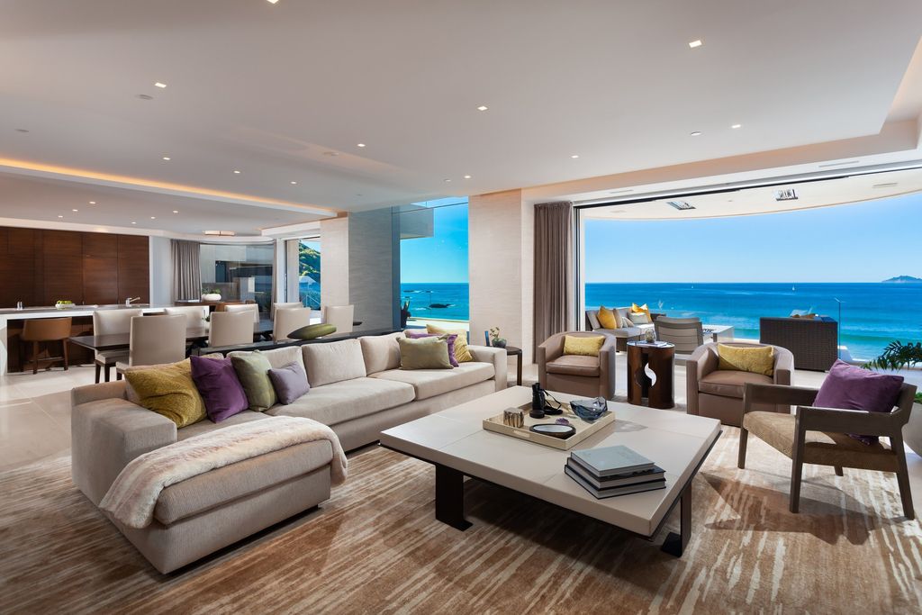 7 Strand Beach Drive in Dana Point, CA is an exquisite property that boasts breathtaking Pacific Ocean views, unparalleled contemporary architecture, and a prime location at The Strand at Headlands. Built in 2018 by Brown Brothers Construction, this modern custom showplace features approximately 9,630 square feet of living space, six ensuite bedrooms, and seven-and-a-half baths, including two primary suites and a junior suite on the top level.