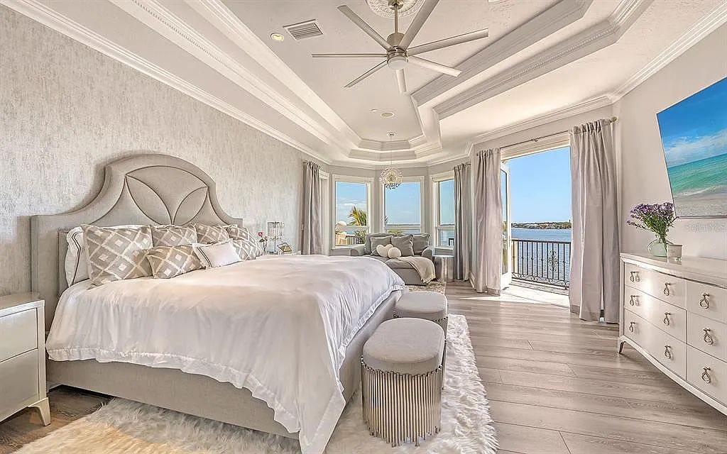 Welcome to a stunning Siesta Key coastal home 1414 Point Crisp Road, Sarasota, Florida with 360-degree bay views and 546 feet of waterfront on Little Sarasota Bay. This 6-bed, 9-bath home boasts 7,162 sqft of living space on 1.22 acres of land.