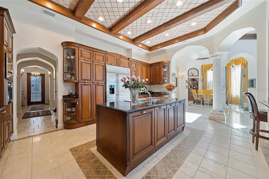 Discover the ultimate in luxury living at 4852 S Peninsula Drive in Ponce Inlet, Florida. This privately gated 3-acre waterfront estate boasts 6 bedrooms, 9 bathrooms, 12,126 sq ft of living space, and a 2.80-acre lot size built in 2004.