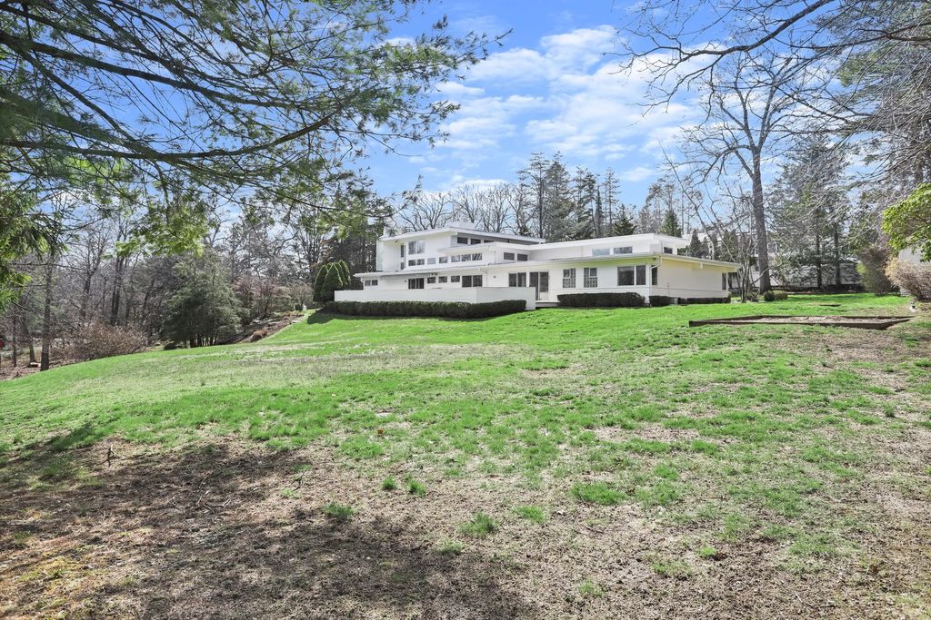 Architectural Marvel: Mid-Century Modern Home in Cos Cob, CT Perfect for Indoor and Outdoor Entertaining Listed at $2.195M