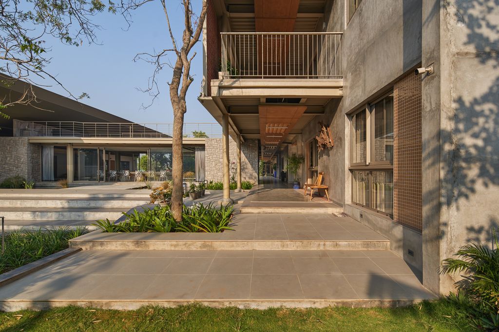 Athachi Farmhouse with Raw, Earthy Tone Exterior by Alchemy Architects