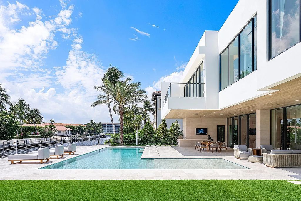 Discover this awe-inspiring waterfront estate at 224 W Key Palm Road, Boca Raton, Florida. Built in 2023 by Sarkela Corp and Ada Architecture Design Atelier, this luxurious property boasts 6 opulent bedrooms, 7 full and 2 half baths, and over 9,500 sq ft of palatial living space.