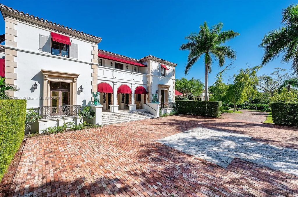 Discover 9401 Journeys End Road, a luxurious 2-acre estate in gated Journey's End, Coral Gables, Florida. Boasting 12,159 sqft of living space, 8 beds/7 baths, & 500ft water frontage with no bridges to the bay.