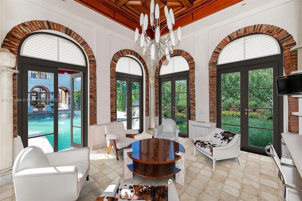 Discover 9401 Journeys End Road, a luxurious 2-acre estate in gated Journey's End, Coral Gables, Florida. Boasting 12,159 sqft of living space, 8 beds/7 baths, & 500ft water frontage with no bridges to the bay.