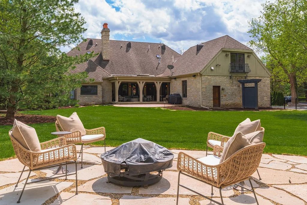 Breathtaking Story Stone Home with Exceptional Landscaping in Bloomington, IL - Priced at $2.249M