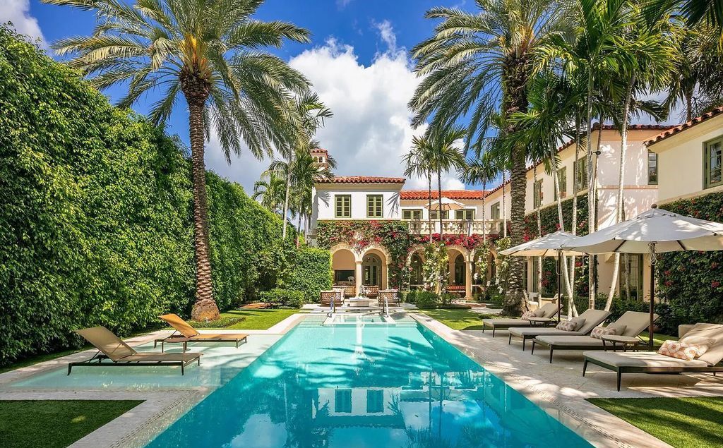 Introducing the stunning 240 Clarke Avenue Estate, a custom-designed property built by Davis General Contracting in Palm Beach, Florida. With 5 bedrooms, 6 bathrooms, and 5,487 square feet of living space, this sun-drenched estate offers a spacious and luxurious living experience.