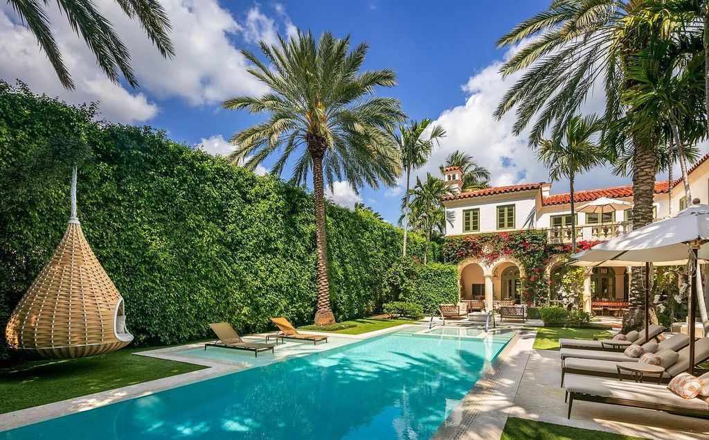 Introducing the stunning 240 Clarke Avenue Estate, a custom-designed property built by Davis General Contracting in Palm Beach, Florida. With 5 bedrooms, 6 bathrooms, and 5,487 square feet of living space, this sun-drenched estate offers a spacious and luxurious living experience.