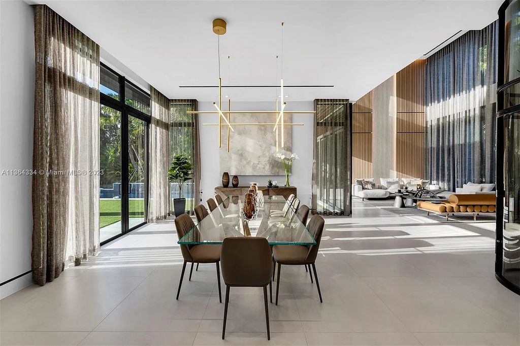 Located at 12500 SW 64th Avenue, Miami, Florida, this new modern estate in Pinecrest will leave you in awe with its level of luxury and sophistication. With 7 bedrooms and 9 bathrooms, this home is spacious enough to accommodate a large family or host guests.