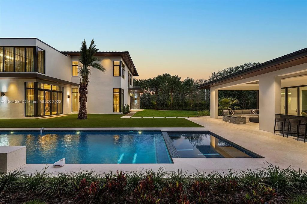 Located at 12500 SW 64th Avenue, Miami, Florida, this new modern estate in Pinecrest will leave you in awe with its level of luxury and sophistication. With 7 bedrooms and 9 bathrooms, this home is spacious enough to accommodate a large family or host guests.