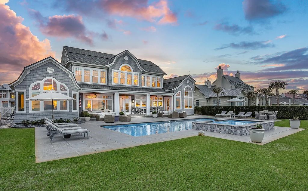 Experience luxury living in this stunning oceanfront estate at 723 Ponte Vedra Boulevard, Ponte Vedra Beach, Florida. Built by Heritage Homes in 2014, this Hampton-esque architectural masterpiece features 6 beds, 6 baths, approximately 5,041 sq ft of living space, and a lot size of 0.42 acres.