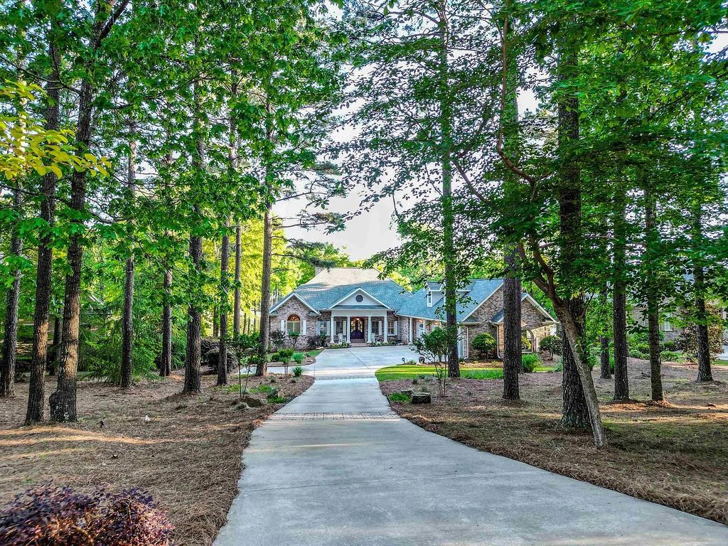 Live in Serenity by the Lake - Stunning Waterfront Brick Home in Greensboro, GA for Sale at $2.449M