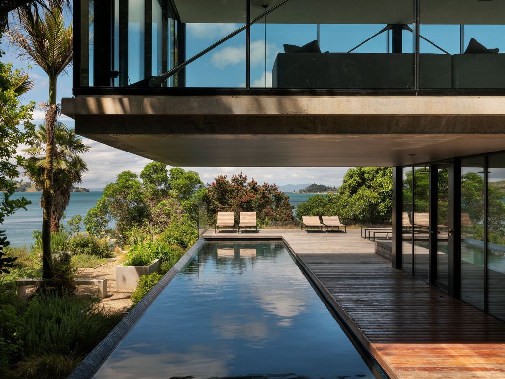 Mahuika House with spaces extend over the pool below by Daniel Marshall