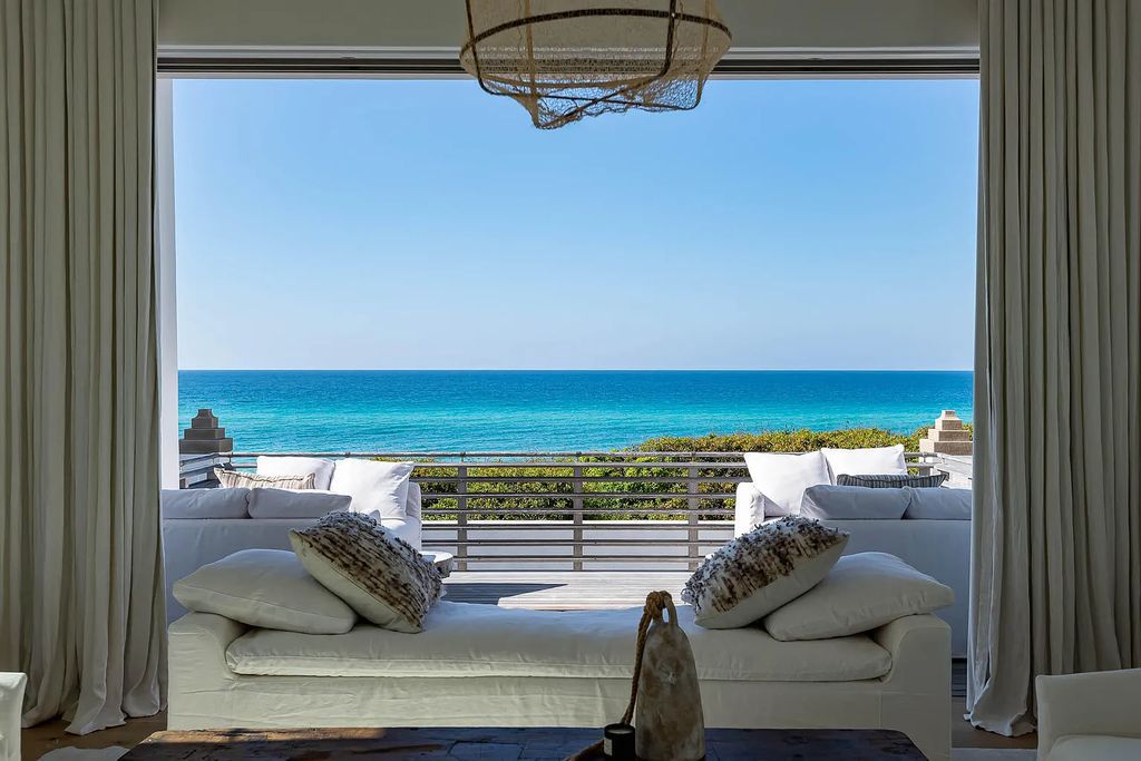 If you are looking for a dream beachfront house that is fit for royalty, look no further than 24 Sea Venture Alley in Inlet Beach, Florida. This stunning property is a true masterpiece, offering a unique combination of luxurious design, exceptional craftsmanship, and breathtaking views of the Gulf of Mexico.
