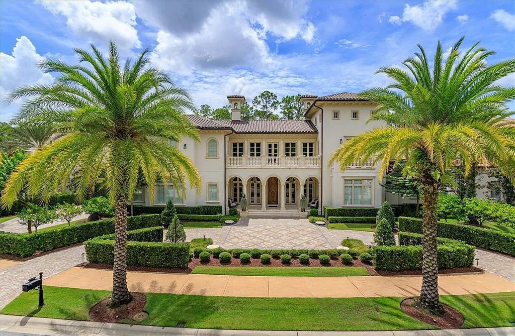 Live in luxury at the Four Seasons Private Residences 10242 Summer Meadow Way in Golden Oak, Orlando, Florida.
