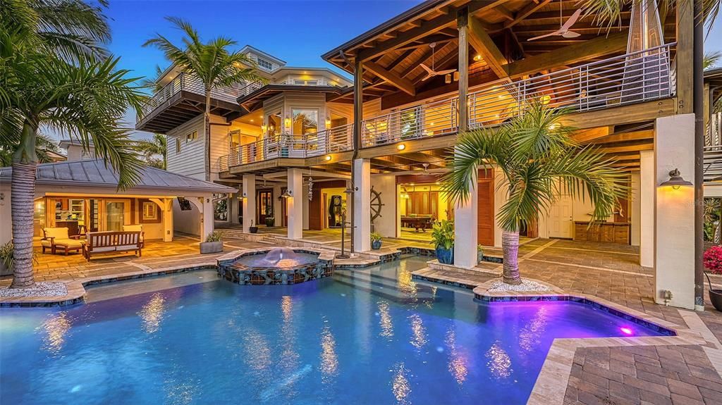 Experience luxury waterfront living at its finest with this stunning custom estate in 10216 46th Avenue W, Bradenton, Florida.