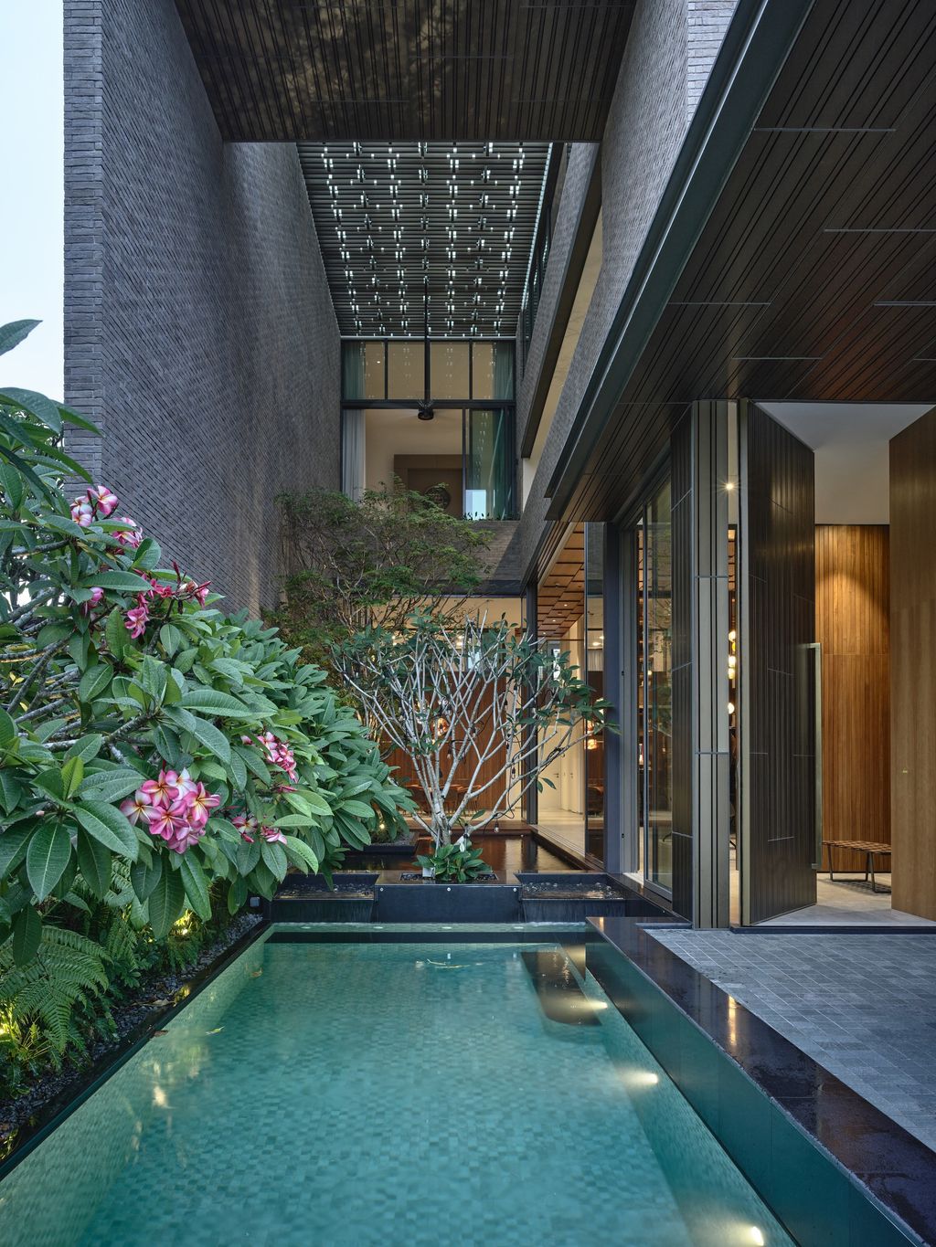 Vertical Oasis House Features Green Oasis Insides by HYLA Architects