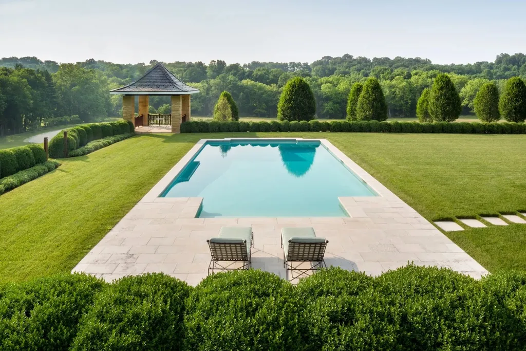 0 Meetinghouse Road, New Hope, Pennsylvania. Meticulously crafted by renowned professionals, this extraordinary estate is nestled in a coveted location off one of Bucks County's most desirable roads. Spanning 44 acres of serene privacy, the residence embodies timeless elegance and meticulous attention to detail. Designed by acclaimed architect Allan Greenberg and featuring the impeccable landscape work of Barbara Paca, this bespoke home seamlessly blends classical elements with modern sophistication.