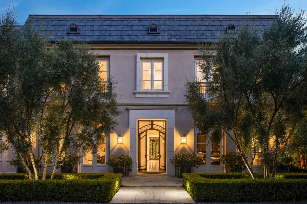 12770 S Bristol Circle Home in Los Angeles, California. Welcome to Bristol Chateau, a stunning classical residence designed by Studio William Hefner in the prestigious Brentwood Park neighborhood. This remarkable estate presents a seamless blend of traditional and contemporary styles. With meticulous attention to detail, Hefner has transformed this French chateau-inspired property into a truly exceptional living space.
