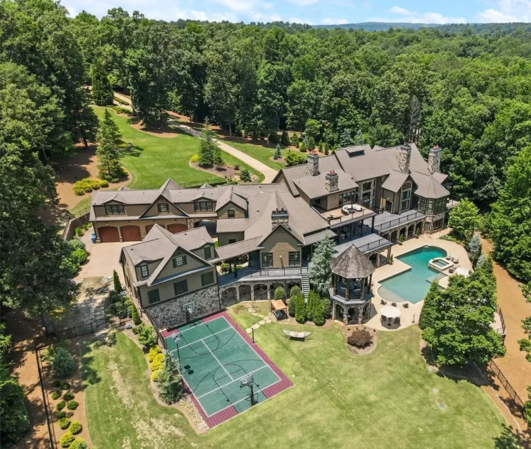 Spectacular Gated Lakefront Estate in Milton with Private Oasis