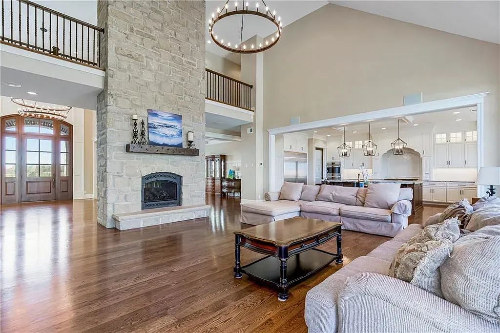 18111 Melrose Drive Home in Overland Park, Kansas. Stunning estate property situated on nearly 8 acres in the coveted Wolf Valley. With over 7600 square feet of living space and an astounding 12 garage spaces, this property offers everything you could ever need.