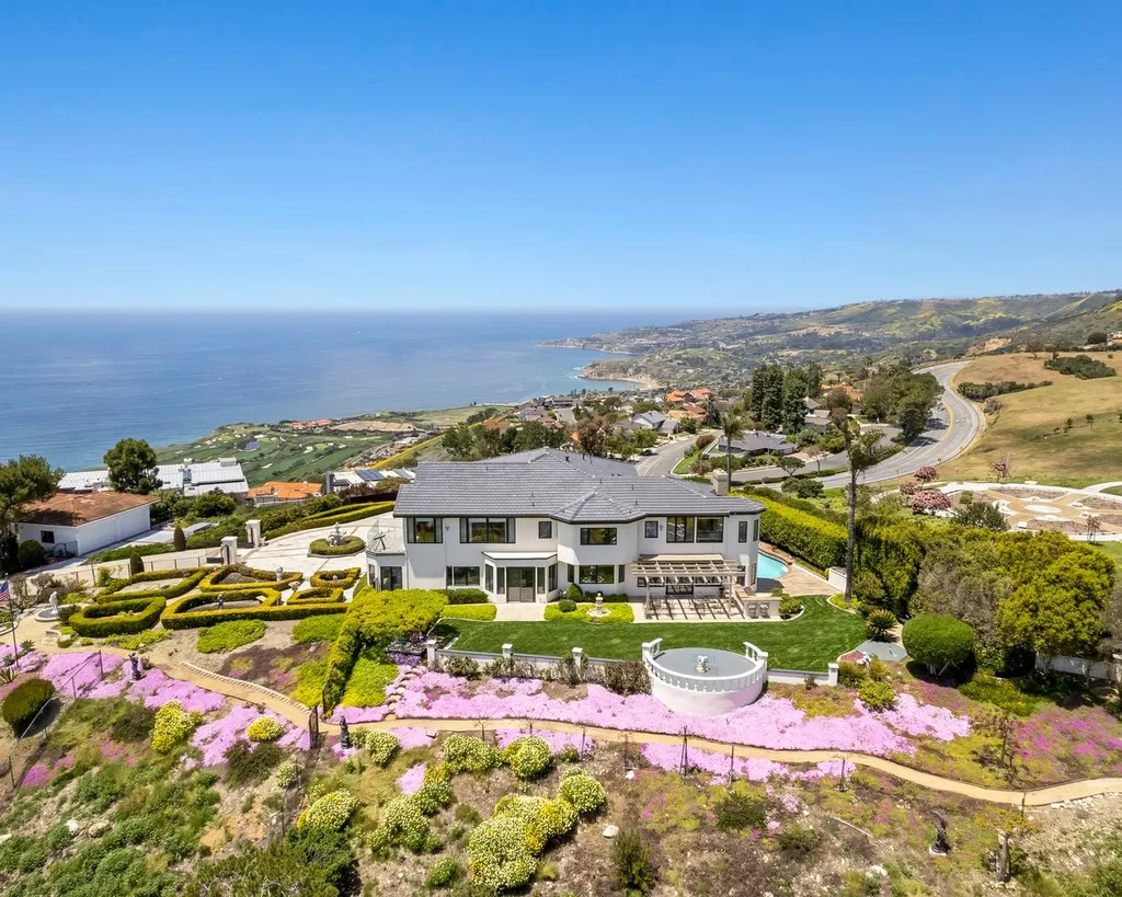 2903 Vista Del Mar Home in Rancho Palos Verdes, California. Discover the extraordinary allure of this exclusive compound-style estate in Rancho Palos Verdes, featuring a sprawling 7,088 square feet of luxurious living space and panoramic coastal views that stretch from Terranea Resort to Dana Point. This remarkable property, nestled on over an acre of meticulously landscaped grounds, offers an array of impressive amenities, including a private driveway, pool and spa, multiple viewing patios, and a walking path that spans the entire length of the estate. With 5 bedrooms, 7 bathrooms, formal living and dining areas, a spacious kitchen with high-end appliances, and a large media room, this one-of-a-kind residence is a testament to refined coastal living. Immerse yourself in the epitome of elegance and serenity in this exceptional home, complete with impeccable design, modern upgrades, and stunning ocean vistas throughout.