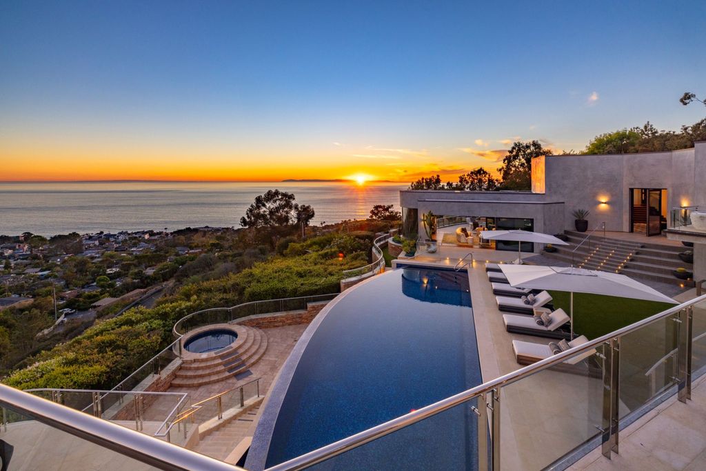 31401 Mar Vista Avenue Home in Laguna Beach, California. Located just minutes away from the prestigious Montage Laguna Beach resort, this unparalleled estate is situated in Southern California, offering stunning views of the Pacific Ocean and access to secluded beaches. Spread across 12 acres of native California landscape, this thoughtfully constructed property showcases exquisite design, abundant natural light, and a seamless integration with the surrounding environment.