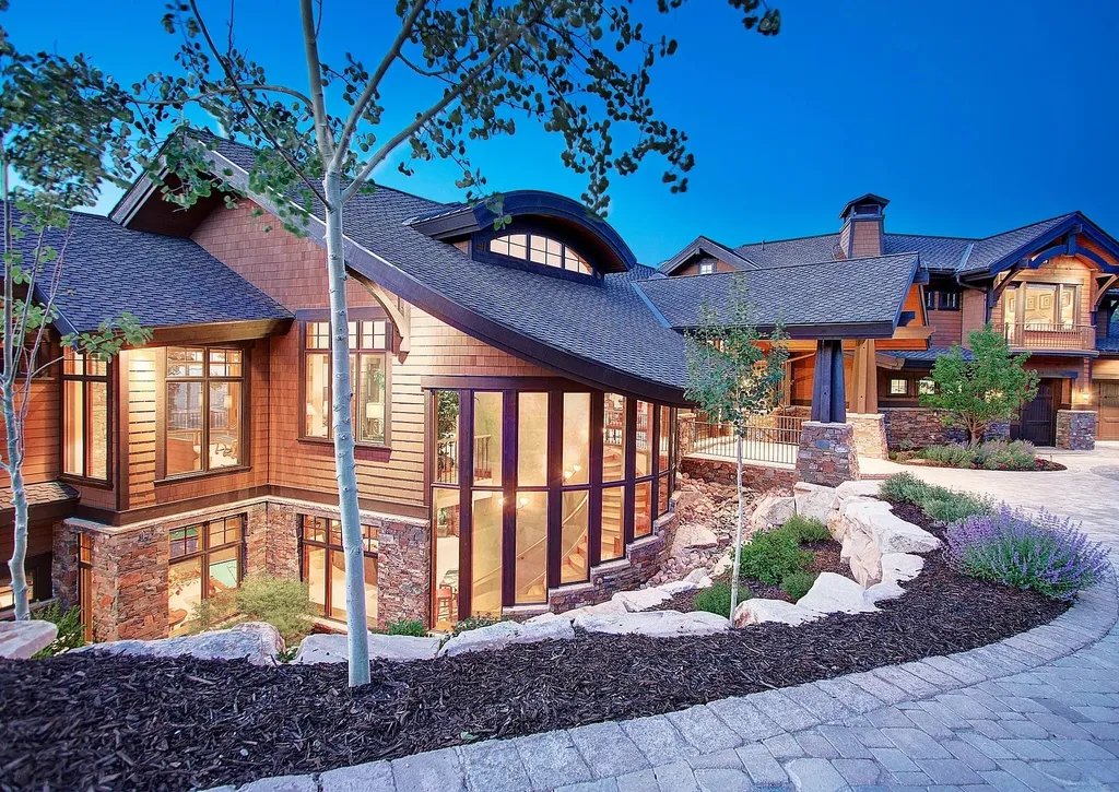 40 White Pine Canyon Road Home in Park City, Utah. Discover this exquisite 8,114 square foot Upwall-designed mountain contemporary home in a private gated community. With rare, breathtaking views of the valley and surrounding mountains, this property offers an exceptional floor plan for elegant mountain living. Enjoy direct access to world-class skiing and the convenience of being minutes away from Park City and Salt Lake International Airport. Explore the potential to add a secondary home on the spacious 5.59-acre lot.