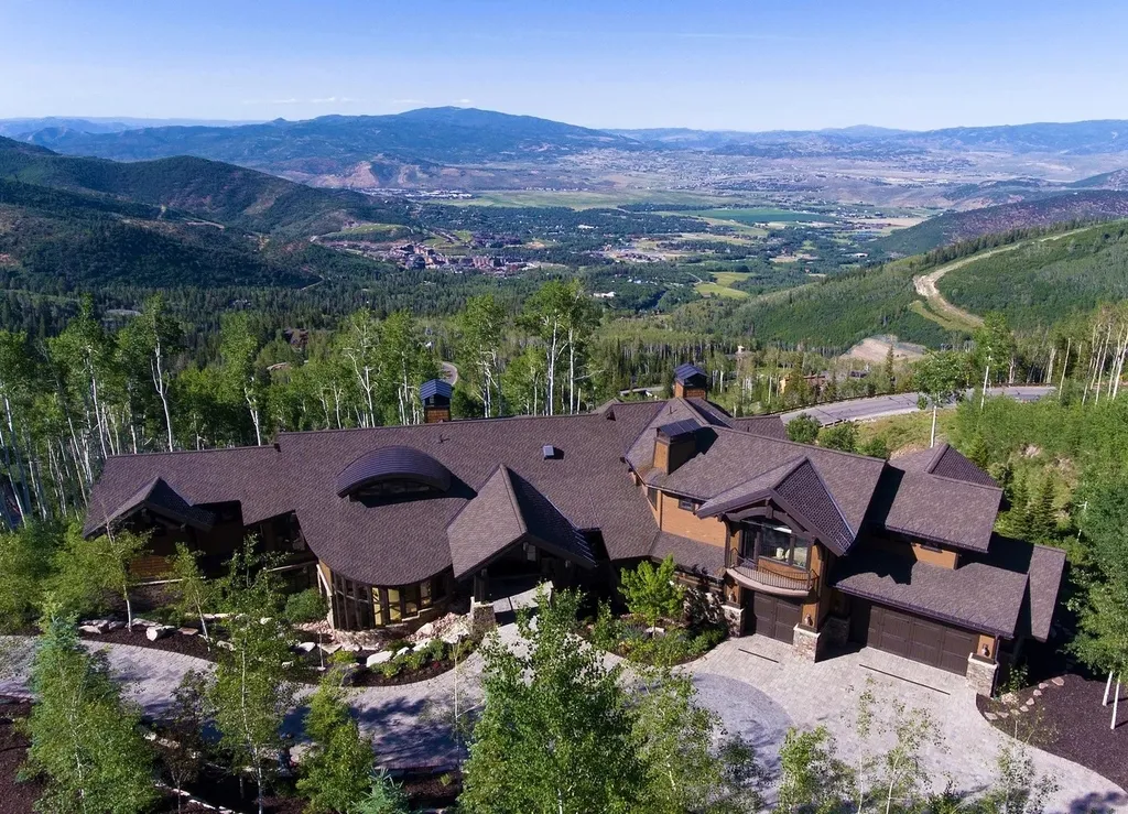 40 White Pine Canyon Road Home in Park City, Utah. Discover this exquisite 8,114 square foot Upwall-designed mountain contemporary home in a private gated community. With rare, breathtaking views of the valley and surrounding mountains, this property offers an exceptional floor plan for elegant mountain living. Enjoy direct access to world-class skiing and the convenience of being minutes away from Park City and Salt Lake International Airport. Explore the potential to add a secondary home on the spacious 5.59-acre lot.