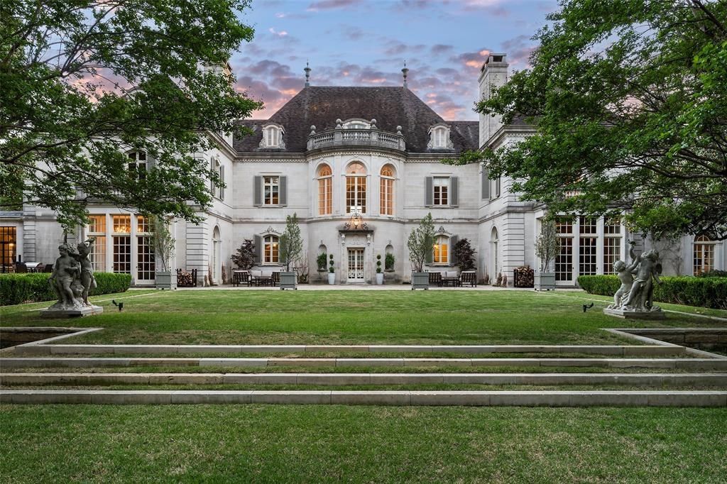 5619 Walnut Hill Lane Home in Dallas, Texas. This luxurious and expertly crafted residential property is an exclusive listing located in Preston Hollow, spanning over 15 acres of private estate. The estate comprises a stunning 27,000 sqft limestone mansion with 14ft ceilings, a 3,000 sqft guest house, and a 4,800 sqft recreational complex complete with a theatre. 