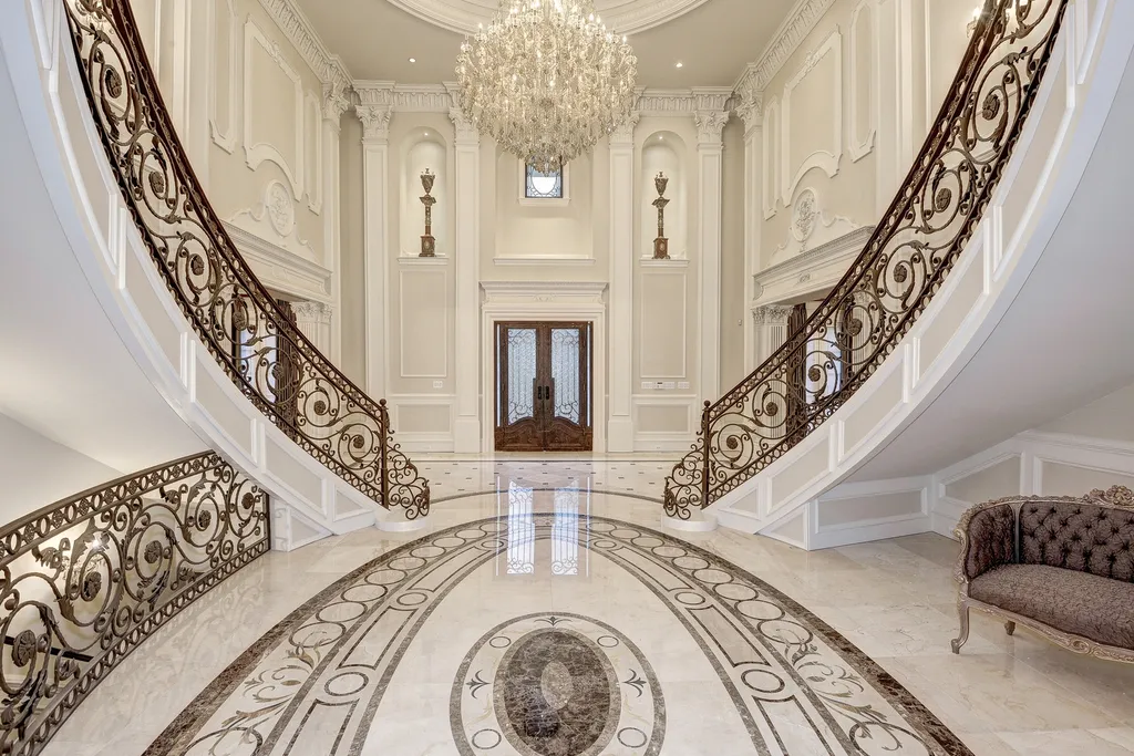 938 Peacock Station Road Home in McLean, Virginia. A vision of master craftsmanship inspired by the Great American mansions, this spectacular 8-BR home boasts every splendid amenity. Newly built of Italian limestone & marble with exquisite design details. 