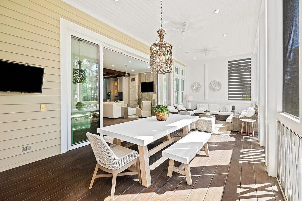 Luxury living awaits at 11 Park Row Lane, Santa Rosa Beach, Florida. This contemporary WaterColor home offers 5 bedrooms, 5 bathrooms, and 3,911 square feet of living space with stunning lake views and high-end upgrades.