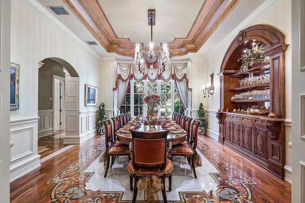 Welcome to 2330 Seven Oaks Lane, Palm Beach Gardens, Florida! This majestic waterfront estate sprawls nearly 3 acres of direct intracoastal waterway, offering 150' of deep water access and a no wake zone.