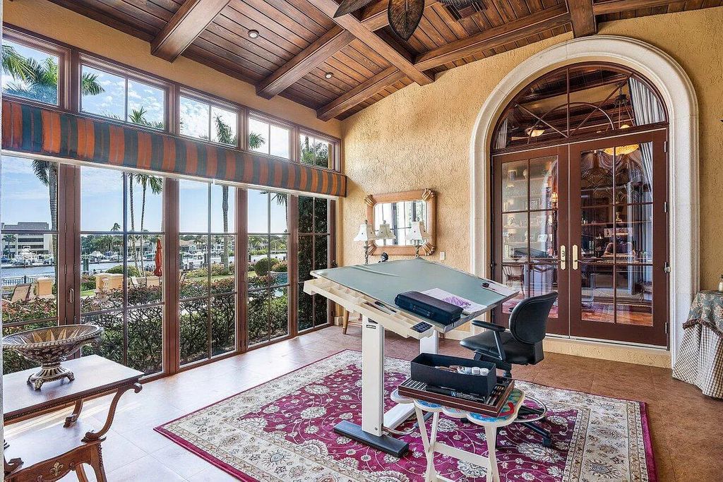 Welcome to 2330 Seven Oaks Lane, Palm Beach Gardens, Florida! This majestic waterfront estate sprawls nearly 3 acres of direct intracoastal waterway, offering 150' of deep water access and a no wake zone.