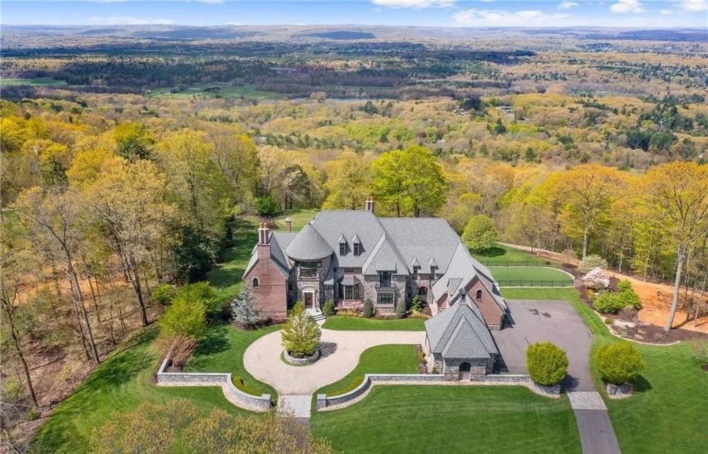 Captivating Brick & Stone French Eclectic-Style Home with Breathtaking Sunset Views in Avon, CT Available for $3.575M