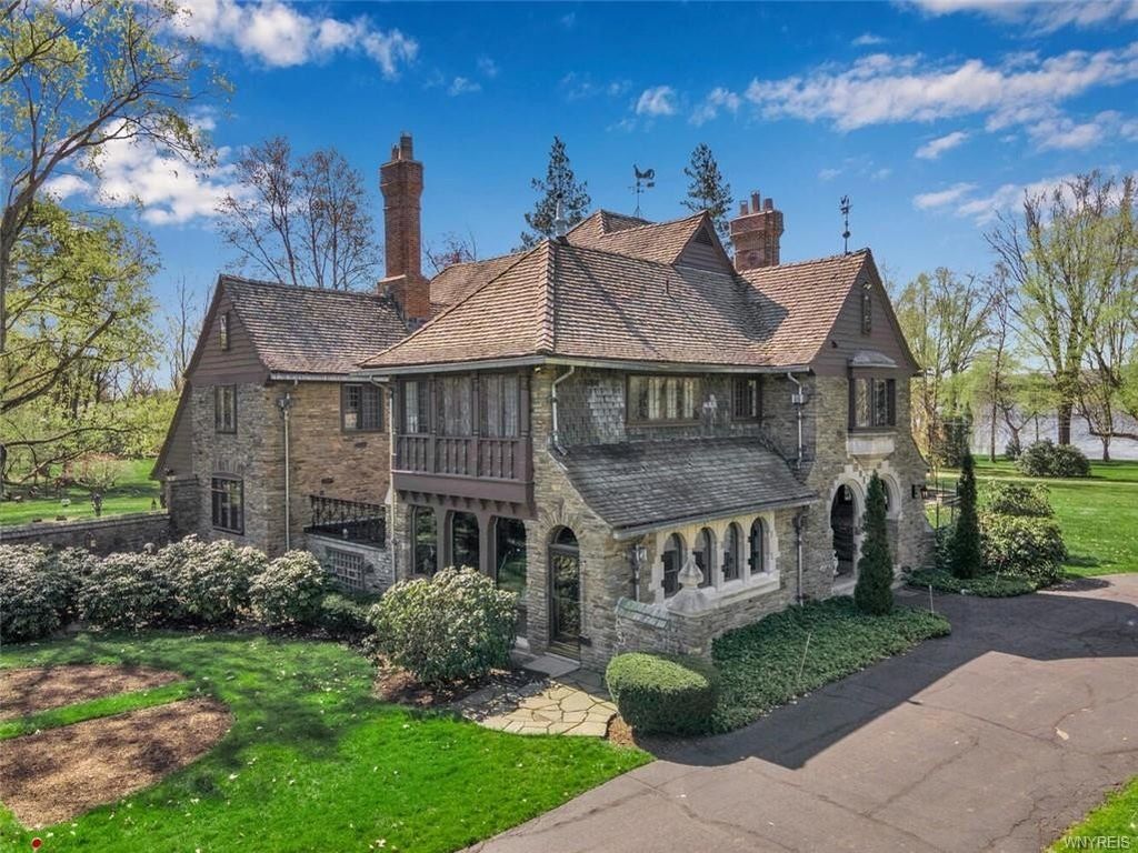 Captivating English Manor in Bemus Point, NY: A Spectacular Retreat with Stunning Water Views, Listed at $5.2M