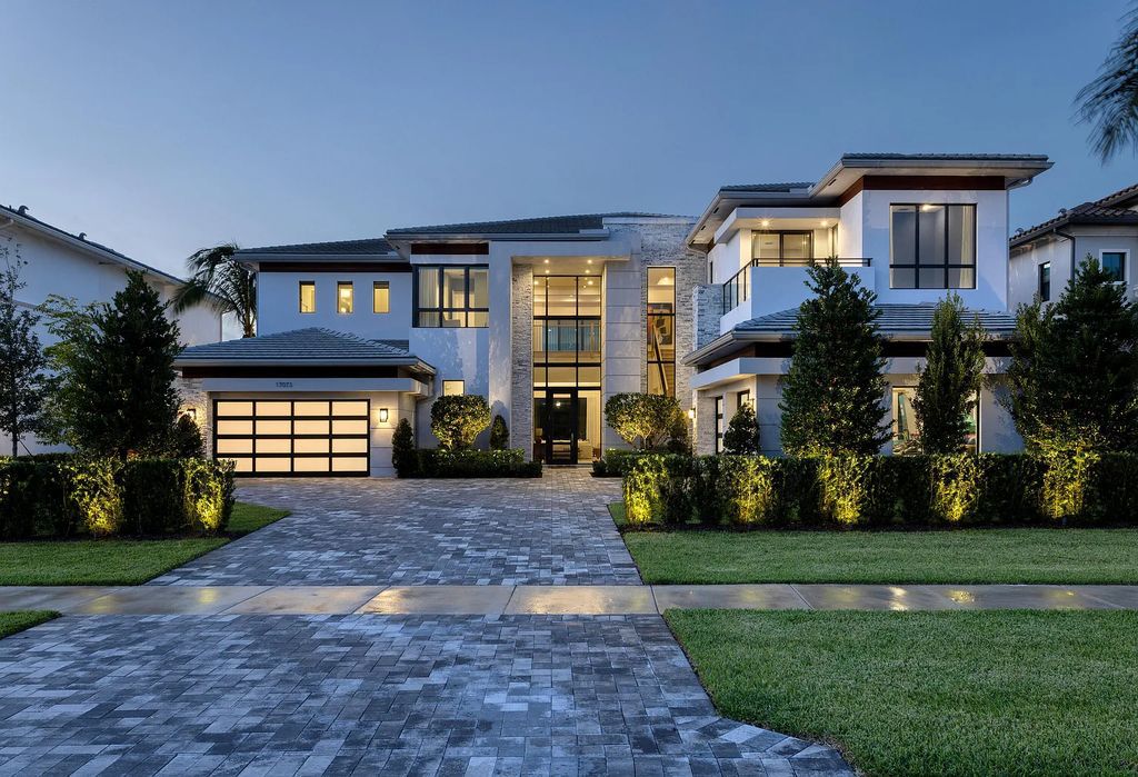 Introducing the Vanderbilt Grand, the largest model at 17073 Brulee Breeze Way, Boca Raton, Florida by GL Homes. This stunning 2022-built residence boasts 6 bedrooms, 9 bathrooms, and 8,179 square feet of pure luxury.
