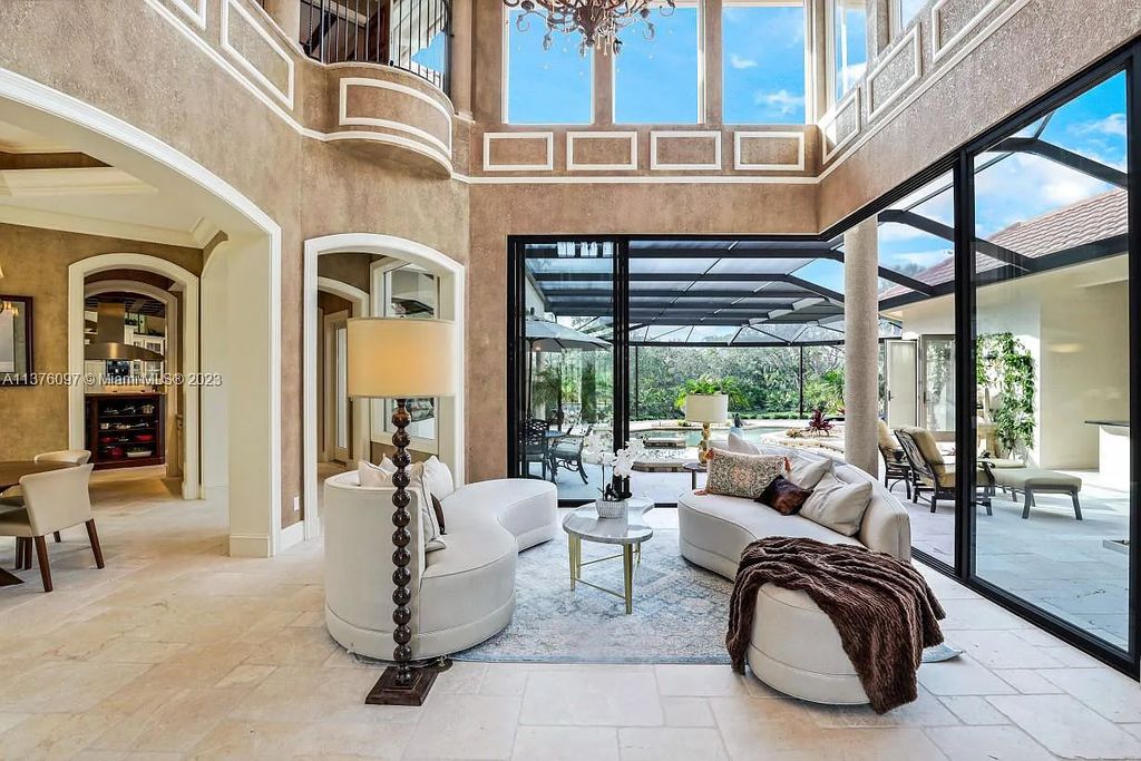 Experience unparalleled luxury living in this stunning 4 bed, 5 bath pool/spa home at 20380 Riverbrooke Run, Estero, Florida. Boasting 4,223 sq ft, it's priced below replacement value and sits on a lush .59 acre private lot.