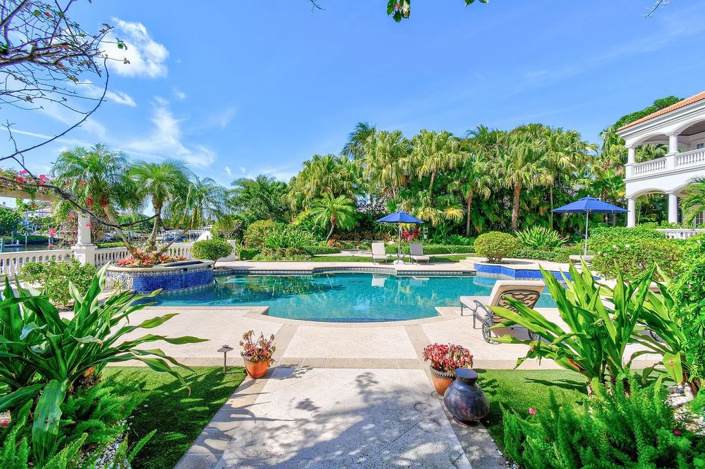 Welcome to 456 Mariner Drive, Jupiter, Florida - a stunning 5BR/6BA estate with 9,101 sq ft living space and a 0.60-acre lot. 