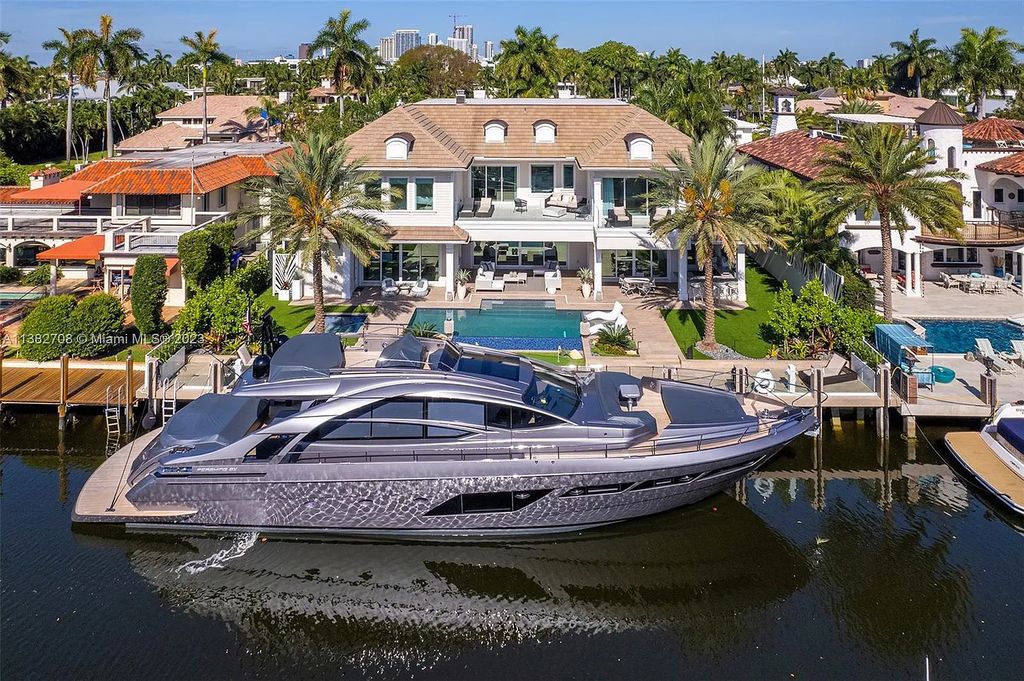 Experience the pinnacle of luxury living at 52 Royal Palm Drive, Fort Lauderdale, Florida. This 2020-built estate boasts 5 beds, 7 baths, 6,682 sqft of living space, and a 0.28-acre lot. Designed by Michael Grey, it offers unmatched elegance and thoughtfully designed spaces.