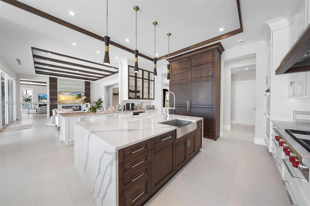 Experience the pinnacle of luxury living at 52 Royal Palm Drive, Fort Lauderdale, Florida. This 2020-built estate boasts 5 beds, 7 baths, 6,682 sqft of living space, and a 0.28-acre lot. Designed by Michael Grey, it offers unmatched elegance and thoughtfully designed spaces.