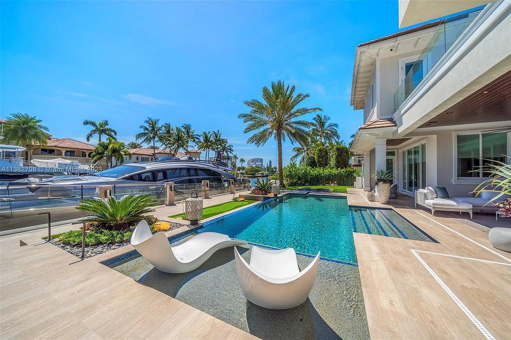 Experience the pinnacle of luxury living at 52 Royal Palm Drive, Fort Lauderdale, Florida. This 2020-built estate boasts 5 beds, 7 baths, 6,682 sqft of living space, and a 0.28-acre lot. Designed by Michael Grey, it offers unmatched elegance and thoughtfully designed spaces.