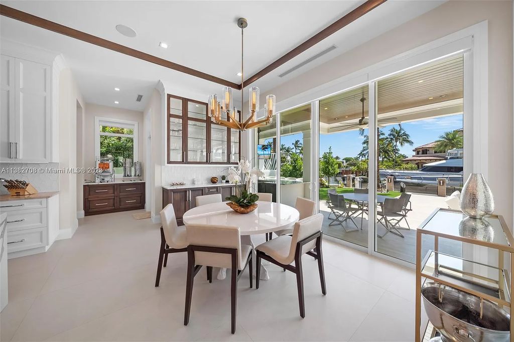 Experience the pinnacle of luxury living at 52 Royal Palm Drive, Fort Lauderdale, Florida. This 2020-built estate boasts 5 beds, 7 baths, 6,682 sqft of living space, and a 0.28-acre lot. Designed by Michael Grey, it offers unmatched elegance and thoughtfully designed spaces.