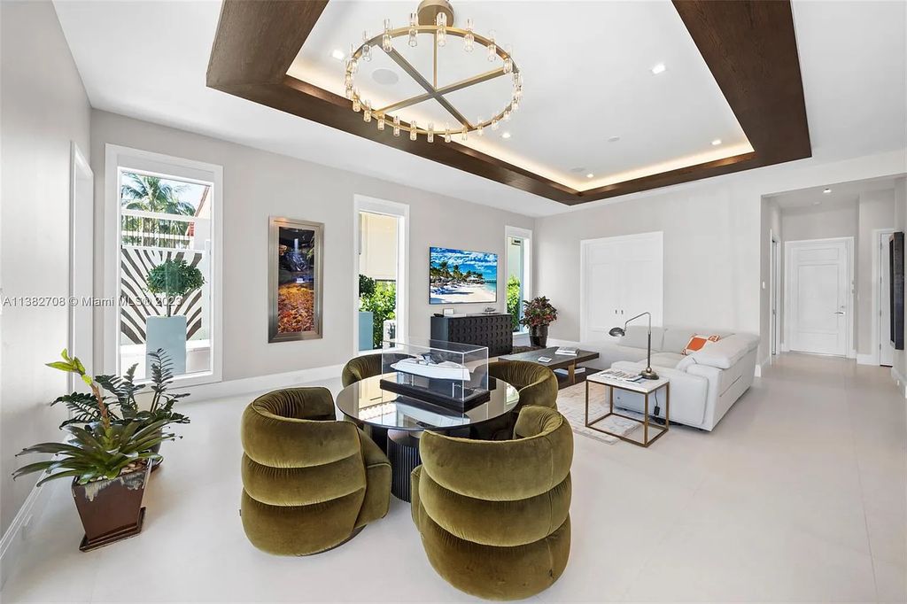 Experience the pinnacle of luxury living at 52 Royal Palm Drive, Fort Lauderdale, Florida. This 2020-built estate boasts 5 beds, 7 baths, 6,682 sqft of living space, and a 0.28-acre lot. Designed by Michael Grey, it offers unmatched elegance and thoughtfully designed spaces.