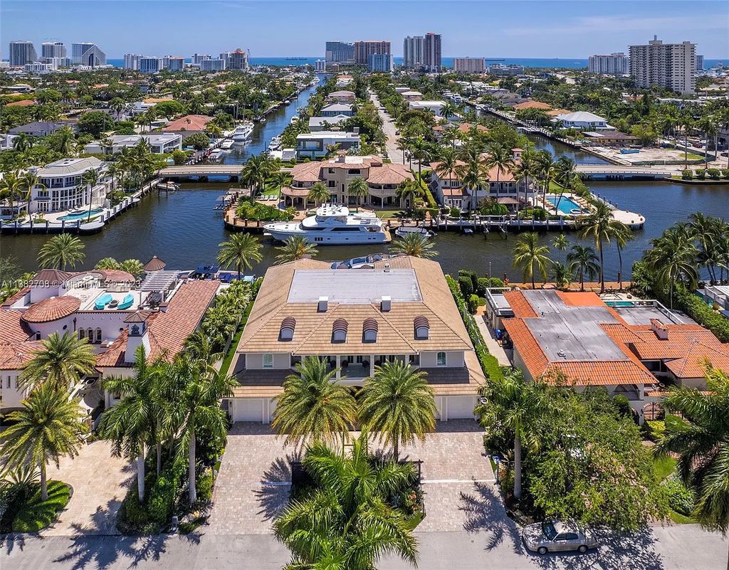 Experience the pinnacle of luxury living at 52 Royal Palm Drive, Fort Lauderdale, Florida. This 2020-built estate boasts 5 beds, 7 baths, 6,682 sqft of living space, and a 0.28-acre lot. Designed by Michael Grey, it offers unmatched elegance and thoughtfully designed spaces.