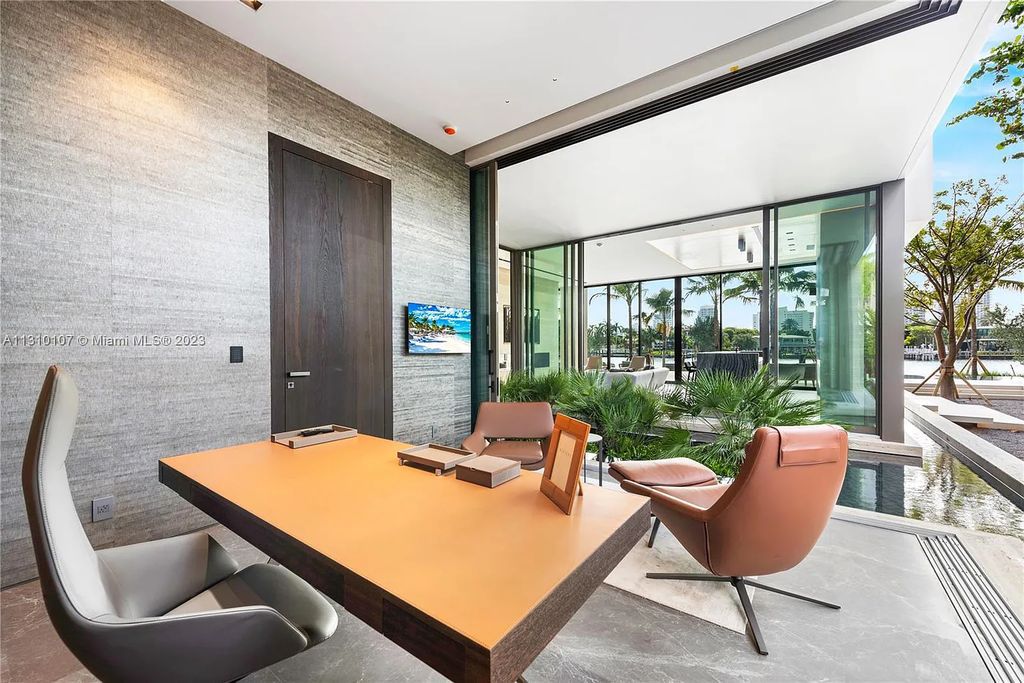 Presenting 98 La Gorce Circle, Miami Beach, Florida an extraordinary Villa Arte by Aquablue Group on Miami Beach's exclusive La Gorce Island. This stunning 7-bedrooms, 13-bathrooms residence spans 14,060 square feet, situated on a 0.76-acre lot.