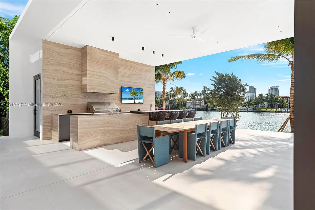 Presenting 98 La Gorce Circle, Miami Beach, Florida an extraordinary Villa Arte by Aquablue Group on Miami Beach's exclusive La Gorce Island. This stunning 7-bedrooms, 13-bathrooms residence spans 14,060 square feet, situated on a 0.76-acre lot.